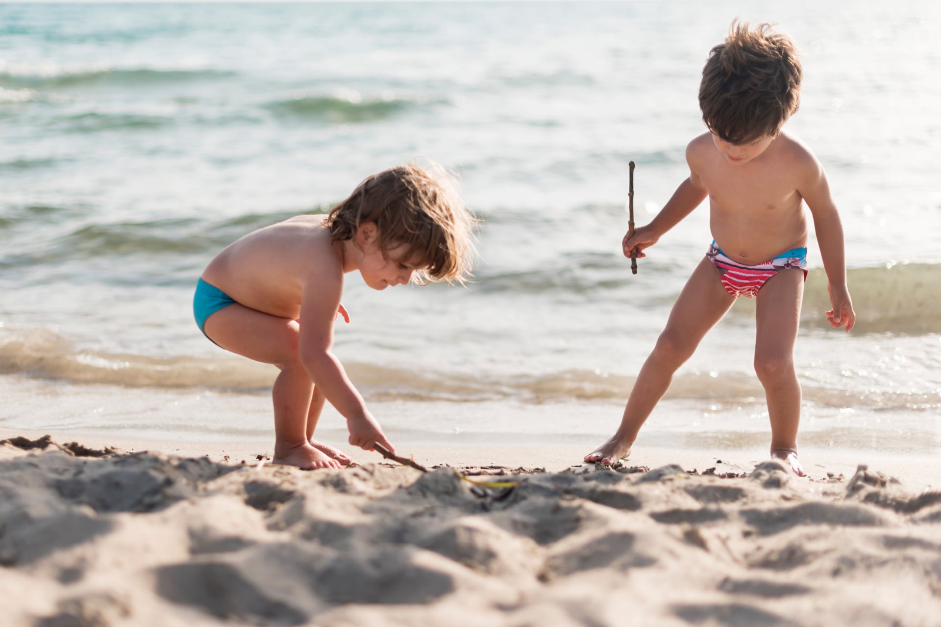 Bambini sulla spiaggia - alberghi.it